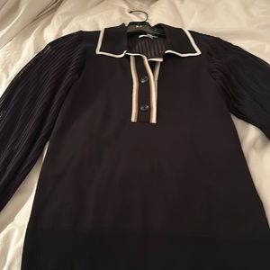 Brand new, only worn once, beautiful polo sweater, so stylish, sheer back